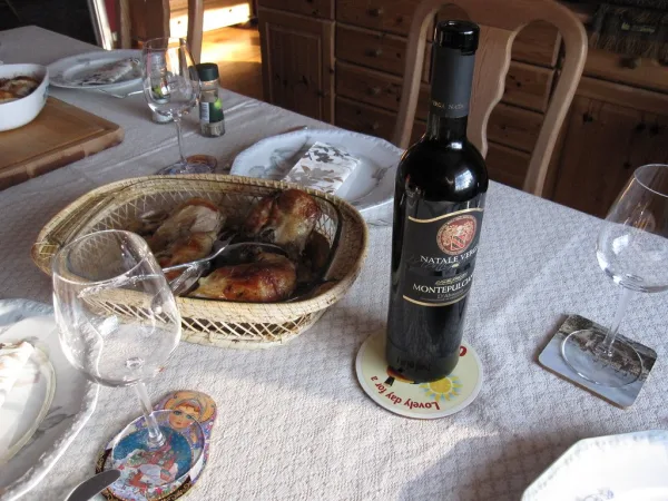 Bread, olive oil and a bottle of red
